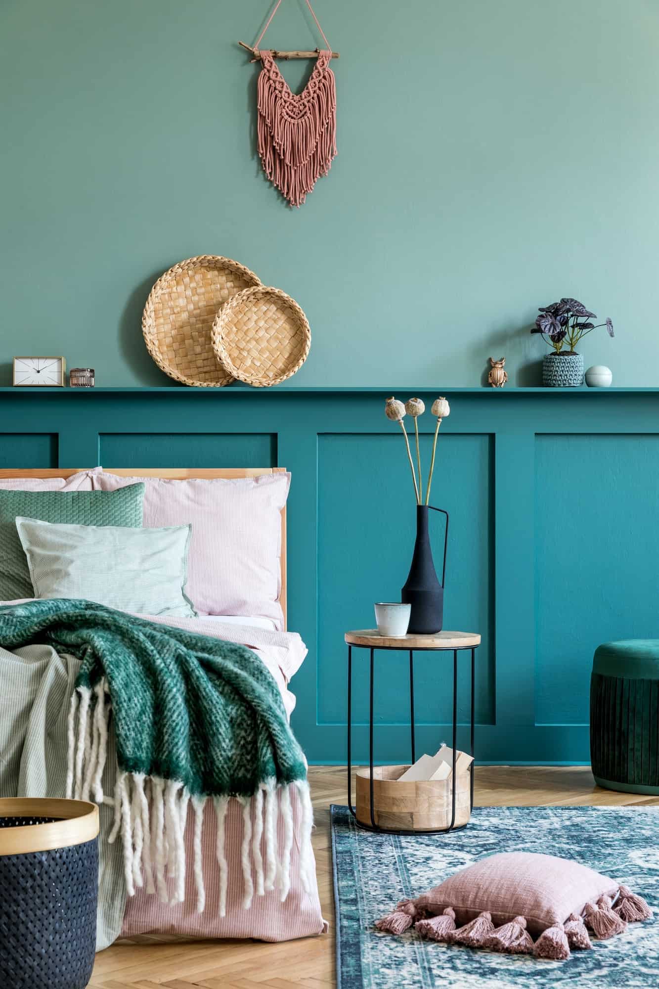 Stylish composition of bedroom interior with wooden bed, design furniture.