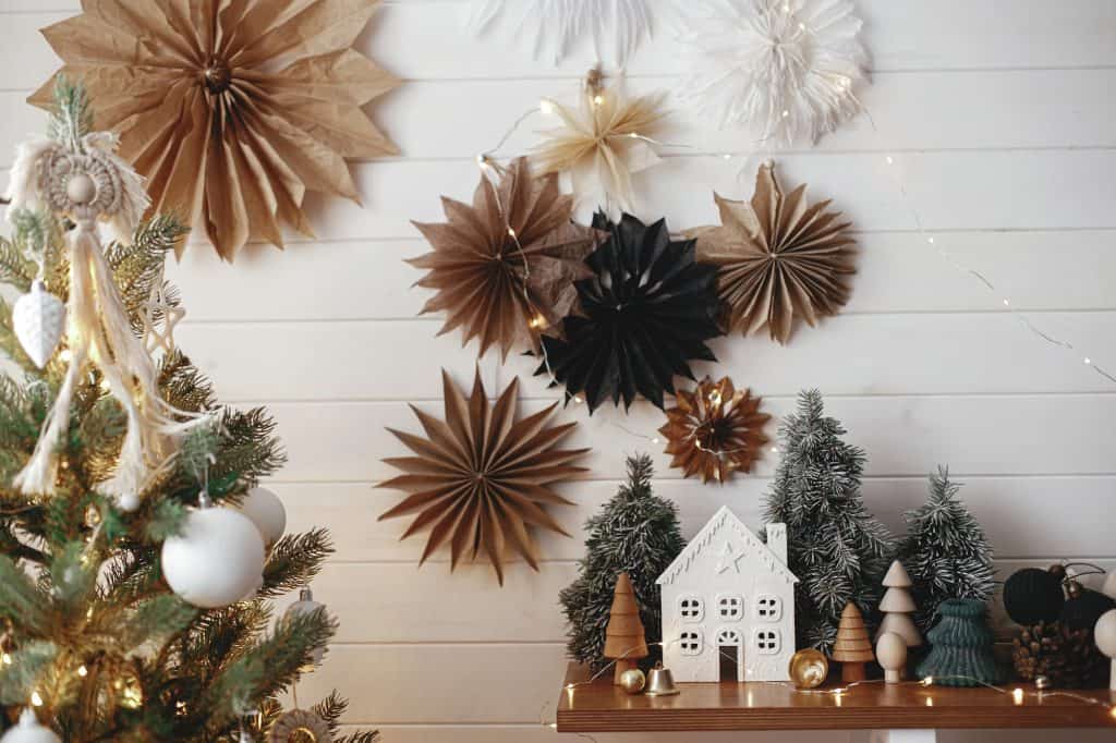 Merry Christmas! Christmas tree, little house, fir, lights, stars. Modern scandi decor. Magic Winter